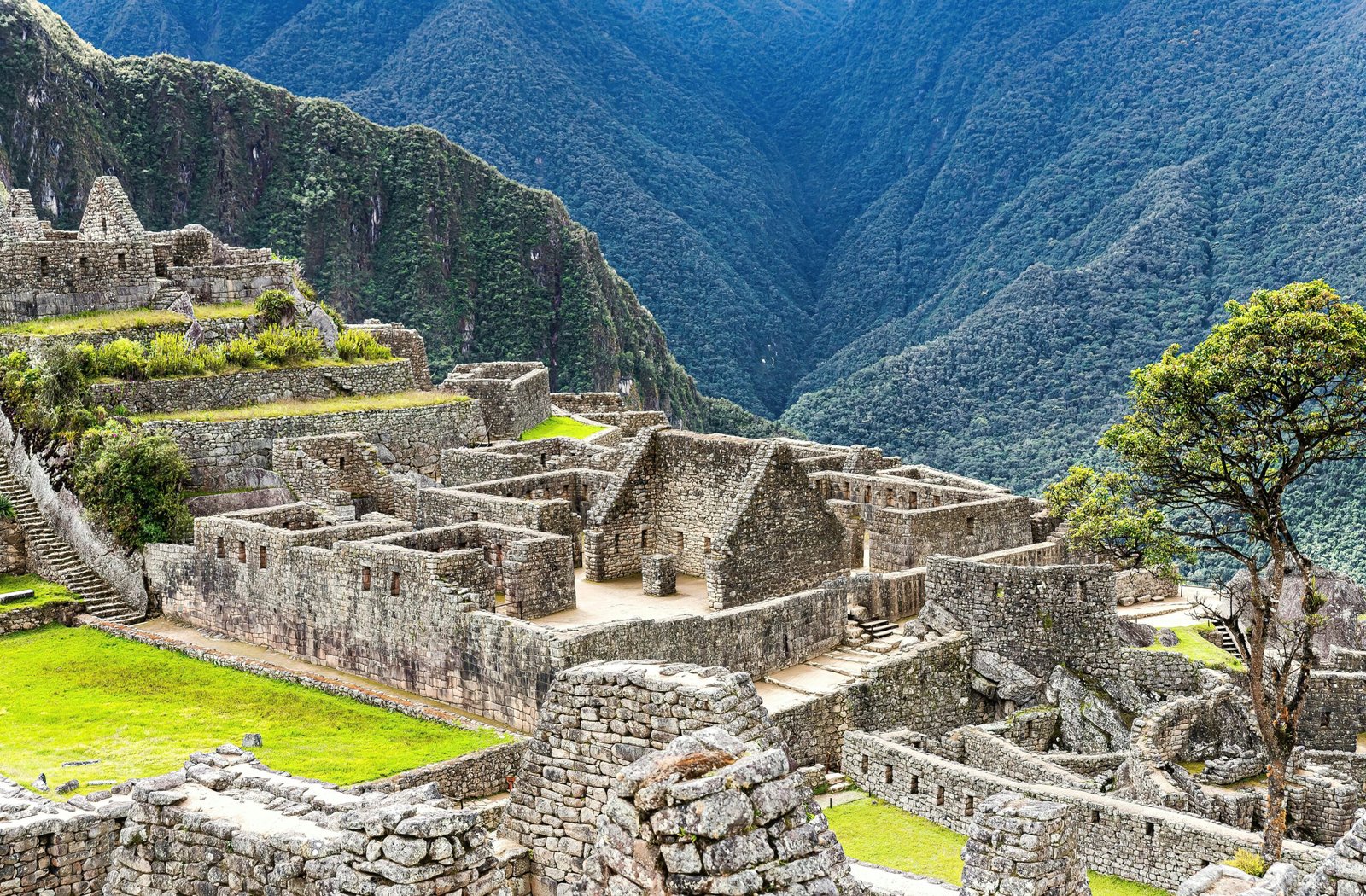 Explore the majestic ruins of Machu Picchu with stunning mountain views.